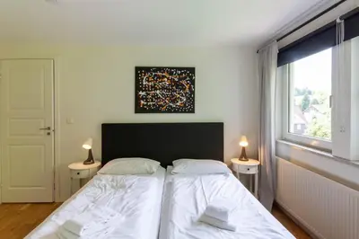Ein Bett oder Betten in einem Zimmer der Unterkunft Ferienhaus Lars