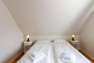 Ein Bett oder Betten in einem Zimmer der Unterkunft Ferienhaus Malte
