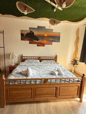 Ein Bett oder Betten in einem Zimmer der Unterkunft myna