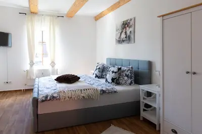 Ein Bett oder Betten in einem Zimmer der Unterkunft Lärchenhof Harz