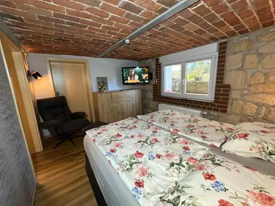 Ein Bett oder Betten in einem Zimmer der Unterkunft Ferienwohnung 