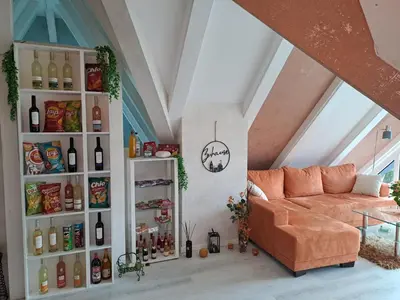 Ein Sitzbereich in der Unterkunft DESIGN-LOFT Brockenblick -Netflix-Smart TV-WLAN-Wallbox-Kaffeevollautomat-Balkon- Panoramaaussicht-Getränke-Pizza-Snacks