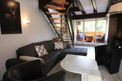 Ein Sitzbereich in der Unterkunft Ferienwohnung Zauberhirsch