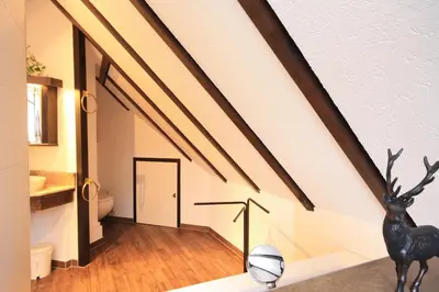 Ein Bett oder Betten in einem Zimmer der Unterkunft Ferienwohnung Zauberhirsch