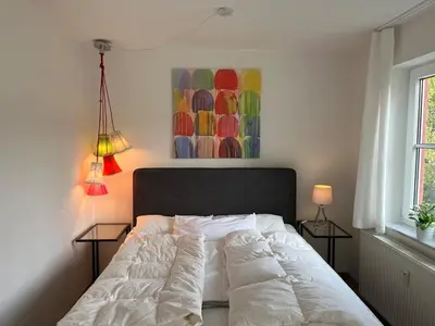 Ein Bett oder Betten in einem Zimmer der Unterkunft Ferienwohnung Panoramablick 33