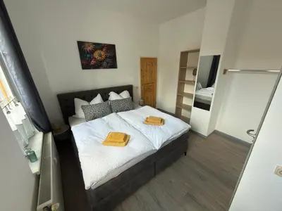 Ein Bett oder Betten in einem Zimmer der Unterkunft TraumFeWo Grüneseck in Innenstadt mit Wald von Harztraveler