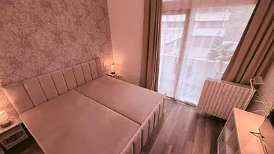 Ein Bett oder Betten in einem Zimmer der Unterkunft Mountain Lodge - modernes Appartement mit Schwimmbad und Sauna - Bad Harzburg im Harz