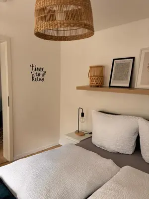 Ein Bett oder Betten in einem Zimmer der Unterkunft Modernes Apartment am Campus II