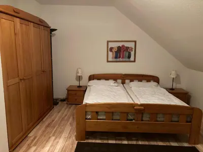 Ein Bett oder Betten in einem Zimmer der Unterkunft Ferienwohnung An der Wurmbergseilbahn