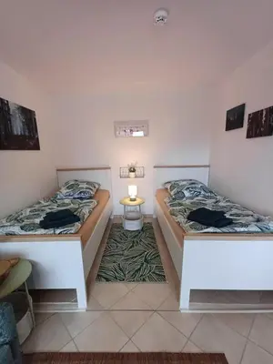 Ein Bett oder Betten in einem Zimmer der Unterkunft Waldgeflüster