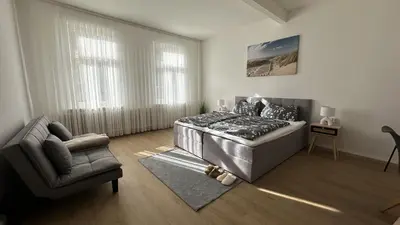Ein Sitzbereich in der Unterkunft Ferienwohnung Kaiserblick