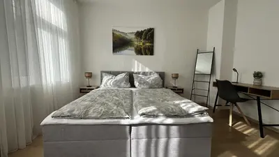 Ein Bett oder Betten in einem Zimmer der Unterkunft Ferienwohnung Kaiserblick