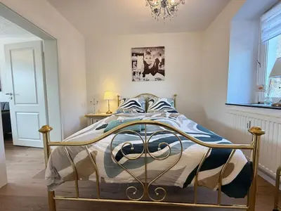 Ein Bett oder Betten in einem Zimmer der Unterkunft Harz-Getaway - Sauna & Nature