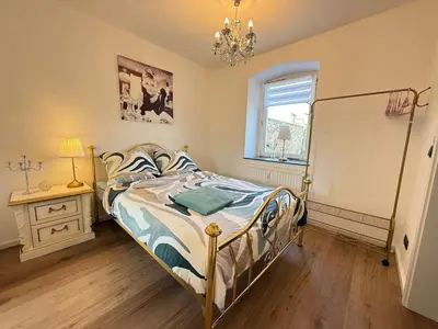 Ein Bett oder Betten in einem Zimmer der Unterkunft Harz-Getaway - Sauna & Nature