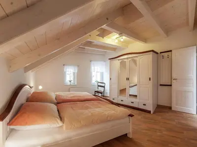 Ein Bett oder Betten in einem Zimmer der Unterkunft Ruhige Ferienwohnung mit Parkplatz in Thale