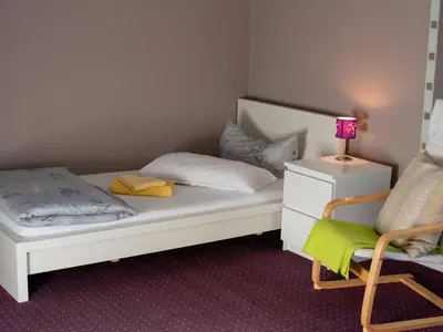Ein Bett oder Betten in einem Zimmer der Unterkunft Brocken-Blick