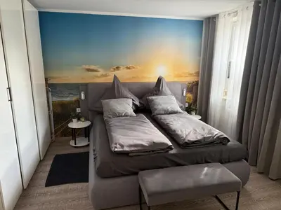Ein Bett oder Betten in einem Zimmer der Unterkunft Ferienwohnung im Harz 3