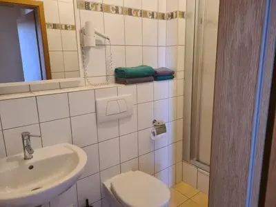 Ein Badezimmer in der Unterkunft Ferienwohnung Thale am Bodetal