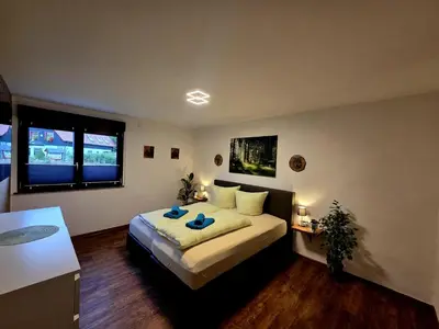 Ein Bett oder Betten in einem Zimmer der Unterkunft Ferienwohnung zum Backstübchen