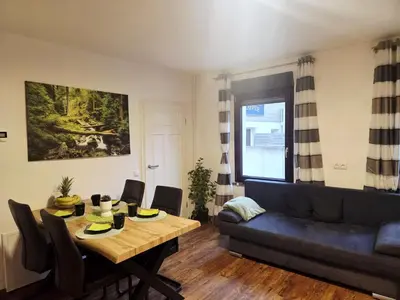 Ein Sitzbereich in der Unterkunft Ferienwohnung zum Backstübchen