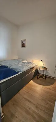 Ein Bett oder Betten in einem Zimmer der Unterkunft Fernblick