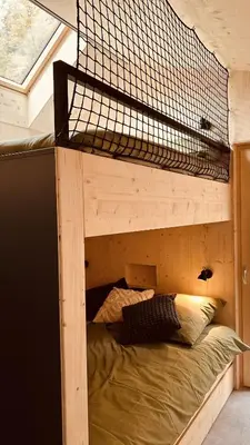 Ein Bett oder Betten in einem Zimmer der Unterkunft elsPARC Walkenried