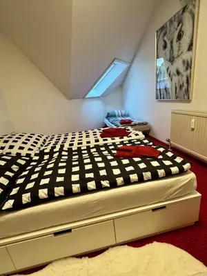 Ein Bett oder Betten in einem Zimmer der Unterkunft Harztastisch Ferienwohnung