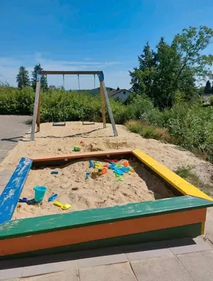 Ein Kinderspielbereich in der Unterkunft Harztastisch Ferienwohnung