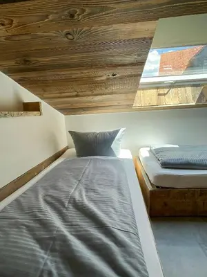 Ein Bett oder Betten in einem Zimmer der Unterkunft Charming Hideaway With Garden Sauna