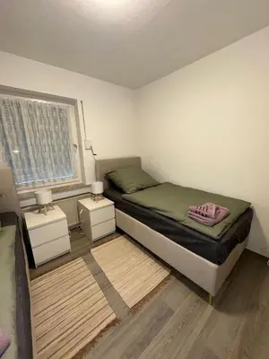 Ein Bett oder Betten in einem Zimmer der Unterkunft Fewo am Rammelsberg