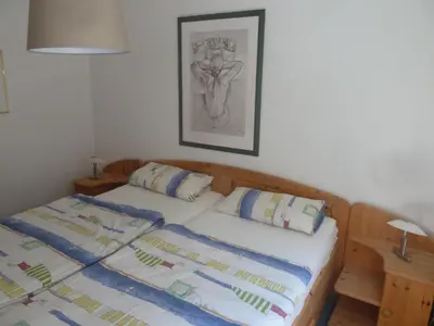Ein Bett oder Betten in einem Zimmer der Unterkunft Residenz Rosenstraße
