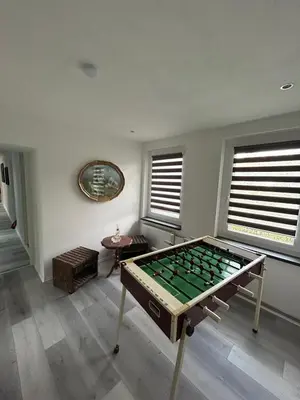 Eine Spielezimmer in der Unterkunft Fewo Möösini am Kanonenberg