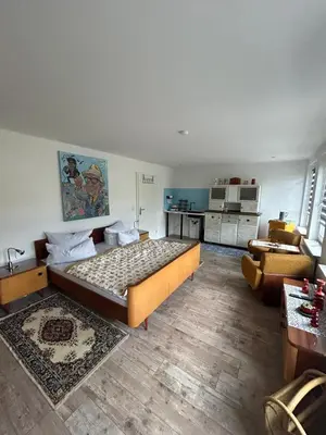 Ein Bett oder Betten in einem Zimmer der Unterkunft Fewo Möösini am Kanonenberg