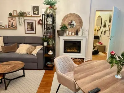 Ein Sitzbereich in der Unterkunft ApartRoß in Villa Eichbaum, zentrale Lage Bummelallee
