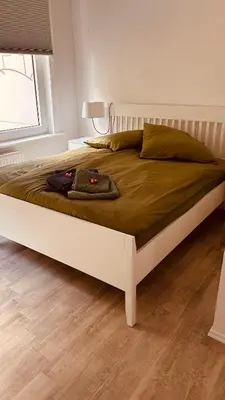 Ein Bett oder Betten in einem Zimmer der Unterkunft Kirchblickapartment Zorge