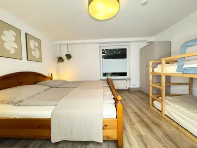 Ein Bett oder Betten in einem Zimmer der Unterkunft Ferienwohnung Leni