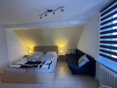 Ein Bett oder Betten in einem Zimmer der Unterkunft Kurze Wege