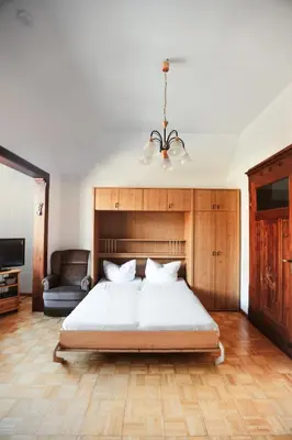 Ein Bett oder Betten in einem Zimmer der Unterkunft Ferienapartments in Schierke am Brocken direkte Wanderweglage