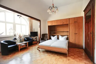Ein Bett oder Betten in einem Zimmer der Unterkunft Ferienapartments in Schierke am Brocken direkte Wanderweglage