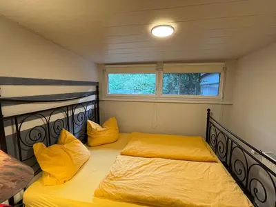 Ein Bett oder Betten in einem Zimmer der Unterkunft Kuschelecke