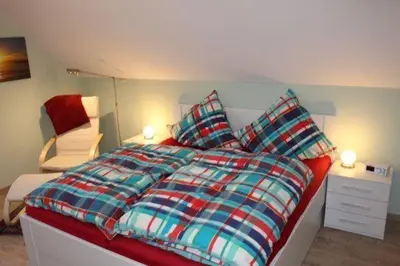 Ein Bett oder Betten in einem Zimmer der Unterkunft Ferienhaus Harzperle Bj. 2017