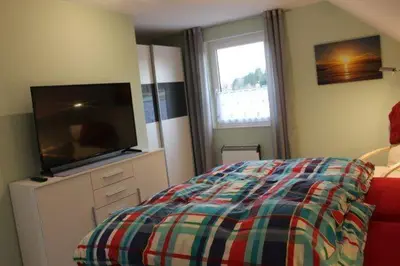 Ein Bett oder Betten in einem Zimmer der Unterkunft Ferienhaus Harzperle Bj. 2017