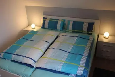 Ein Bett oder Betten in einem Zimmer der Unterkunft Ferienhaus Harzperle Bj. 2017