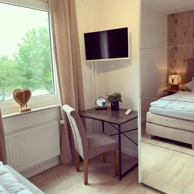 Ein Bett oder Betten in einem Zimmer der Unterkunft Berg-Quartier