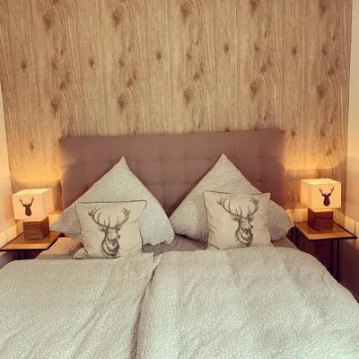 Ein Bett oder Betten in einem Zimmer der Unterkunft Berg-Quartier