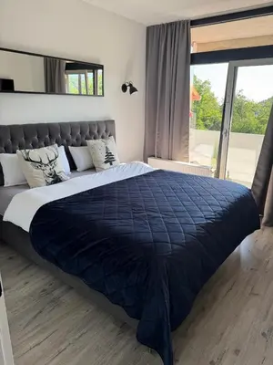 Ein Bett oder Betten in einem Zimmer der Unterkunft Schöne Aussicht - charmante Ferienwohnung mit Pool und Sauna in Bad Harzburg