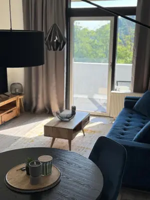 Ein Sitzbereich in der Unterkunft Schöne Aussicht - charmante Ferienwohnung mit Pool und Sauna in Bad Harzburg