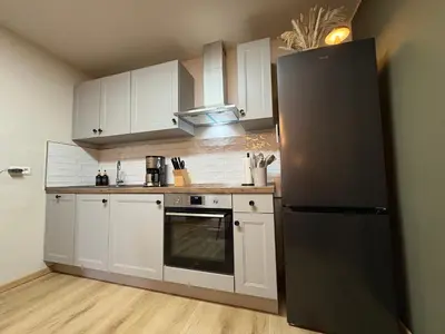 Küche/Küchenzeile in der Unterkunft Harzburgliving Apartment Harzstay mit Terrasse