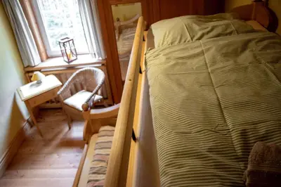 Ein Bett oder Betten in einem Zimmer der Unterkunft Rodelhaus Braunlage