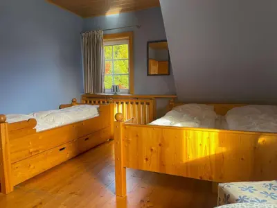 Ein Bett oder Betten in einem Zimmer der Unterkunft Rodelhaus Braunlage